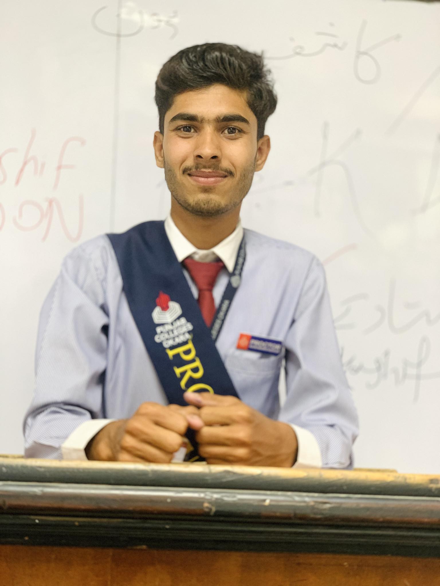 Muhammad Abubakr in college uniform, student and entrepreneur
